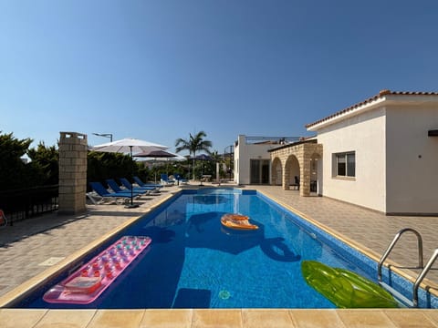 Property building, Pool view, Swimming pool, sunbed