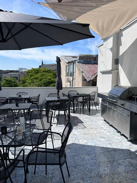 Property building, BBQ facilities, View (from property/room), Balcony/Terrace, Seating area