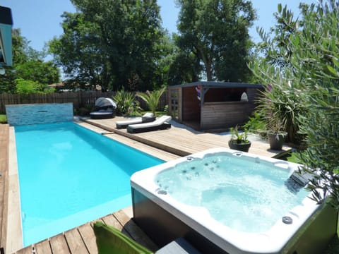 VILLA DREAM LANDES Piscine tempérée-Jacuzzi-5 suites parentales Villa in Moliets-et-Maa