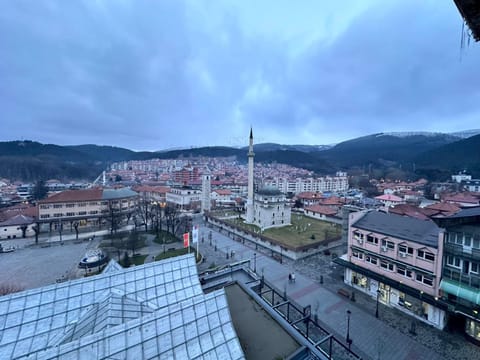 Nearby landmark, Day, Neighbourhood, Natural landscape, City view, Mountain view, Location