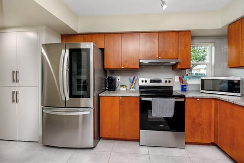 Kitchen or kitchenette, dishwasher, oven, stove, toaster