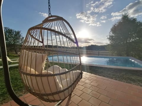 Patio, Day, Natural landscape, Pool view, Swimming pool, sunbed