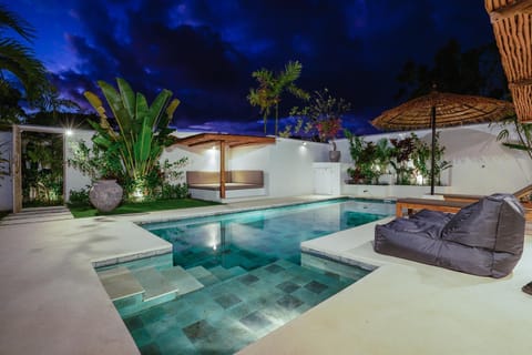 Property building, Patio, Night, Pool view, Swimming pool, sunbed