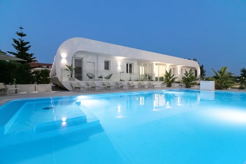 Property building, Night, Pool view, Swimming pool, Swimming pool, sunbed