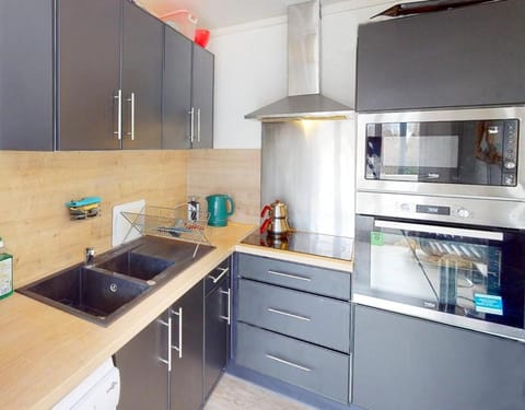 Kitchen or kitchenette, oven, stove