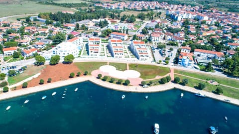 Nearby landmark, Day, Neighbourhood, Natural landscape, Bird's eye view, Beach, City view
