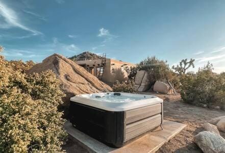 Hot Tub Boulders Art-Infused Adobe- Stella House in Yucca Valley