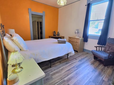 Bed, Seating area, Bedroom