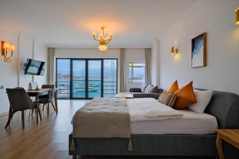 Bed, Seating area, Sea view