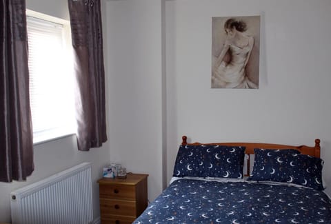 Cosy room with 3 bed spaces in a friendly bungalow Urlaubsunterkunft in Aylesbury Vale