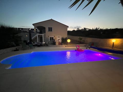 Property building, Night, Pool view, Swimming pool, sunbed