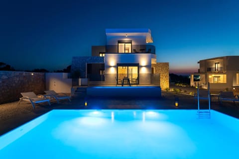 Property building, Patio, Night, Pool view, Swimming pool, sunbed