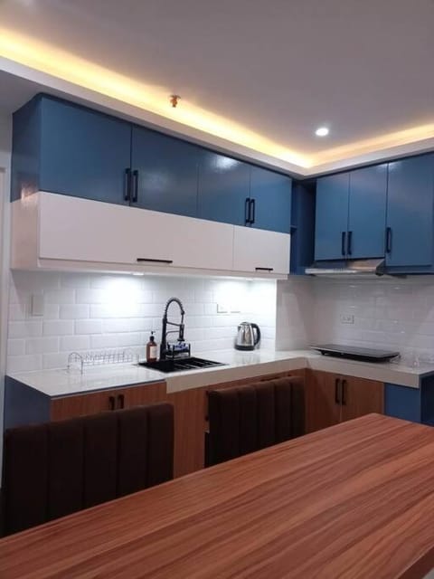 Balai ni Boss - Cozy Modern 1BR in Victoria Sports Tower Condominio in Quezon City