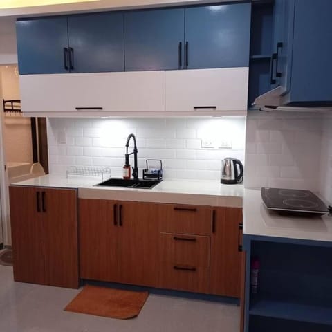 Balai ni Boss - Cozy Modern 1BR in Victoria Sports Tower Condo in Quezon City