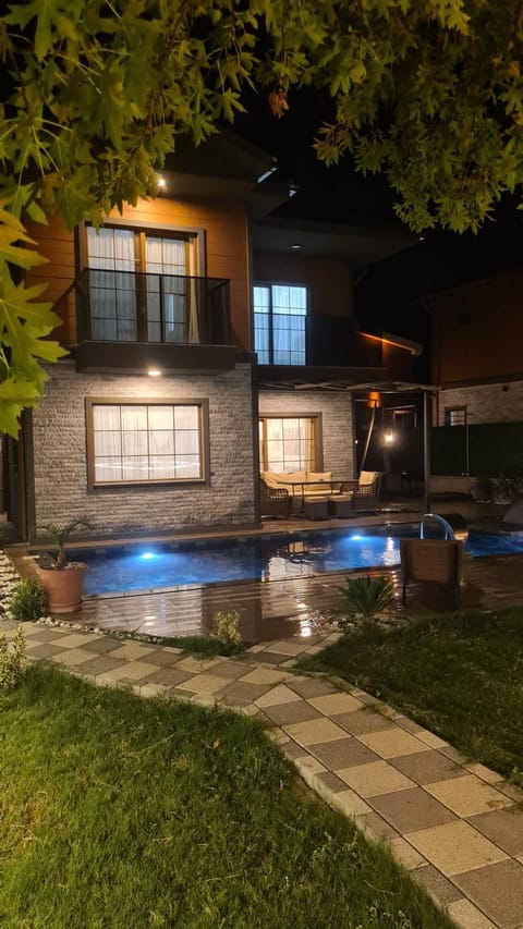 Property building, Night, Garden, Garden view, Pool view, Swimming pool