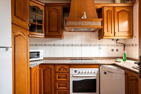 Kitchen or kitchenette, oven, stove, toaster