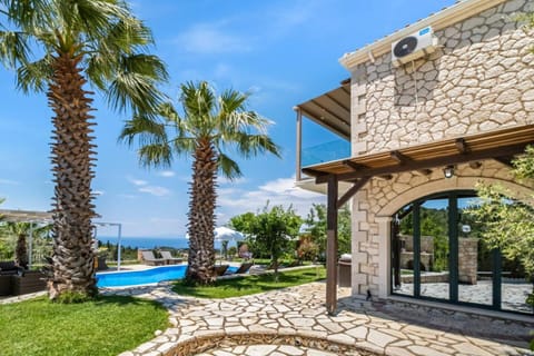 Property building, Patio, Natural landscape, Garden, Garden view, Pool view, Sea view, Swimming pool, sunbed