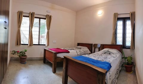 Raintree Garden Bed and Breakfast in Mysuru