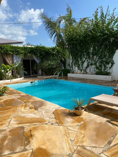 Patio, Day, Pool view, Swimming pool, sunbed