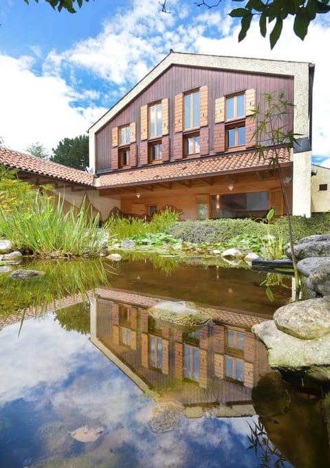 Property building, Day, Natural landscape, Lake view, Swimming pool