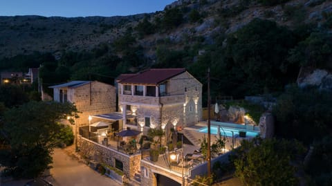 Property building, Night, Natural landscape, Mountain view, Pool view, Swimming pool