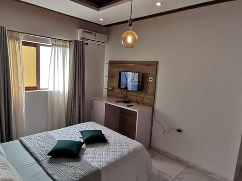 Chambre de luxe chez FOUR IN ONE Résidence Condo in Cameroon