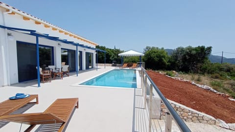 Property building, Swimming pool, Swimming pool, sunbed