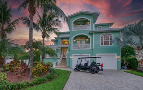 Waterfront Luxury w/ Heated Salt Pool & Golf Cart House in Indian Rocks Beach