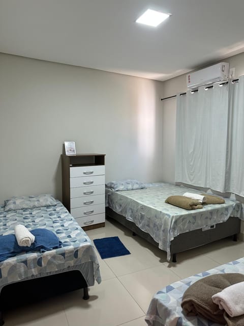 Bed, Photo of the whole room, Bedroom, towels, air conditioner