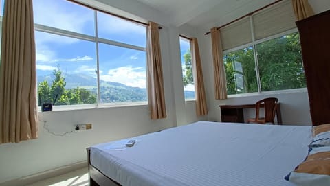 Bed, View (from property/room), Photo of the whole room, Bedroom, City view, Mountain view, wardrobe