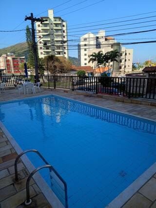 Apto pé na areia com piscina Apartment in Caraguatatuba