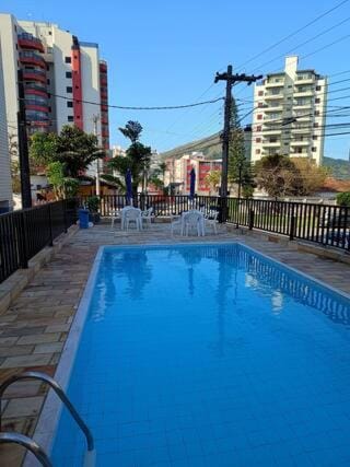 Apto pé na areia com piscina Apartment in Caraguatatuba