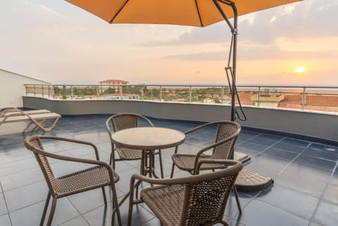 Patio, Day, View (from property/room), Balcony/Terrace, Living room, Seating area, Dining area, Sea view