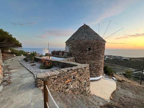 Property building, Day, Natural landscape, Landmark view, Sea view, Sunset