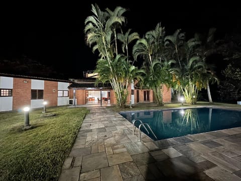 Property building, Night, Garden, Garden view, Pool view, Swimming pool