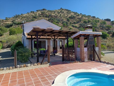 Property building, Patio, Natural landscape, Mountain view, Pool view, Swimming pool, sunbed