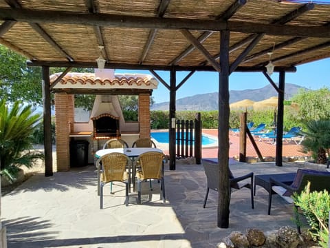 Patio, BBQ facilities, Pool view, Swimming pool