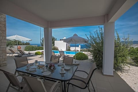 Patio, Balcony/Terrace, Dining area, Sea view, Swimming pool