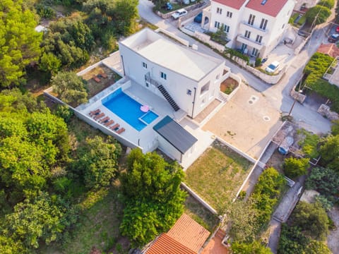 Property building, Bird's eye view, Swimming pool, Parking