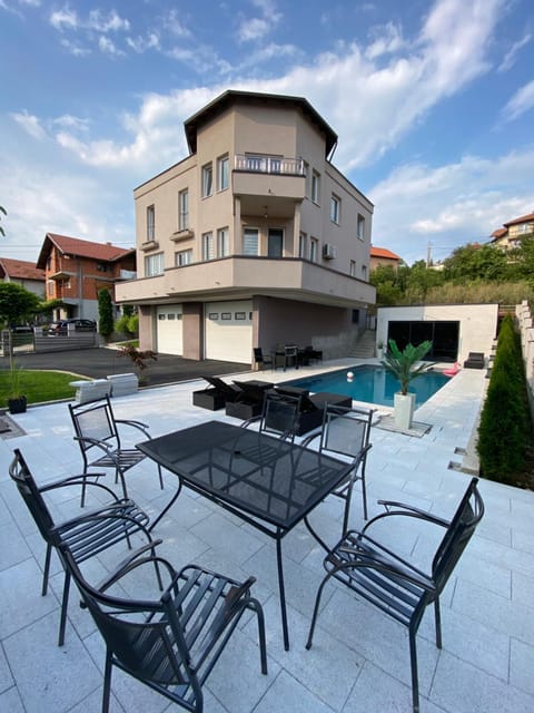 Property building, Day, Garden, View (from property/room), Balcony/Terrace, Pool view, Swimming pool