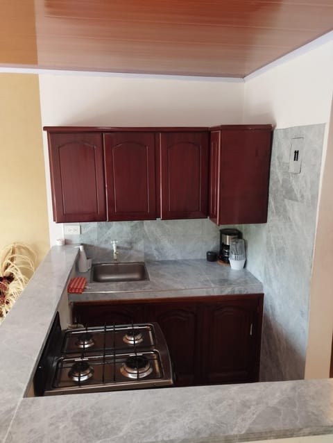 Kitchen or kitchenette, stove