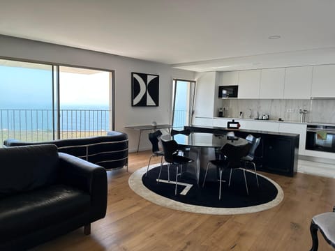 Kitchen or kitchenette, Living room, Dining area, Sea view