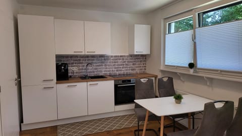 Kitchen or kitchenette, Dining area, dishwasher, stove