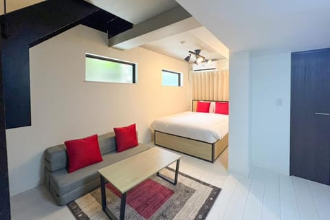 Bed, Living room, Seating area, Bedroom, air conditioner