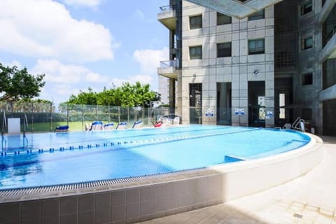 Holiday stay with pool and sea view Condominio in Netanya