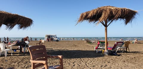 Nearby landmark, Day, People, Beach, Sea view, group of guests, sunbed