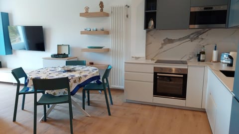 Dining area, microwave, oven, stove, kitchen