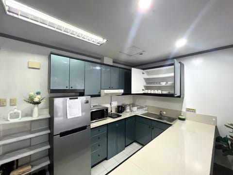 Kitchen or kitchenette, microwave, storage, storage, stove, stove, kitchen, kitchen