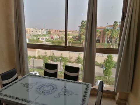 An elegant apartment for rent with a pool and a view of the mountains in Marrakesh Copropriété in Marrakesh