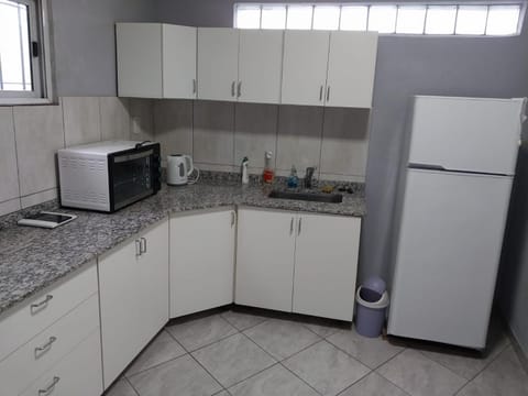 Kitchen or kitchenette, oven